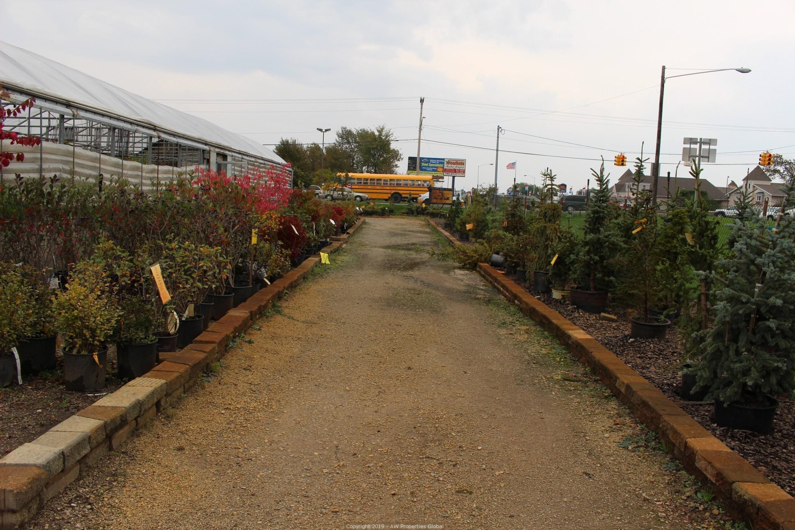 Approx. 3 Acres Commercial Zoned Land with 1 Building & 5 Greenhouses