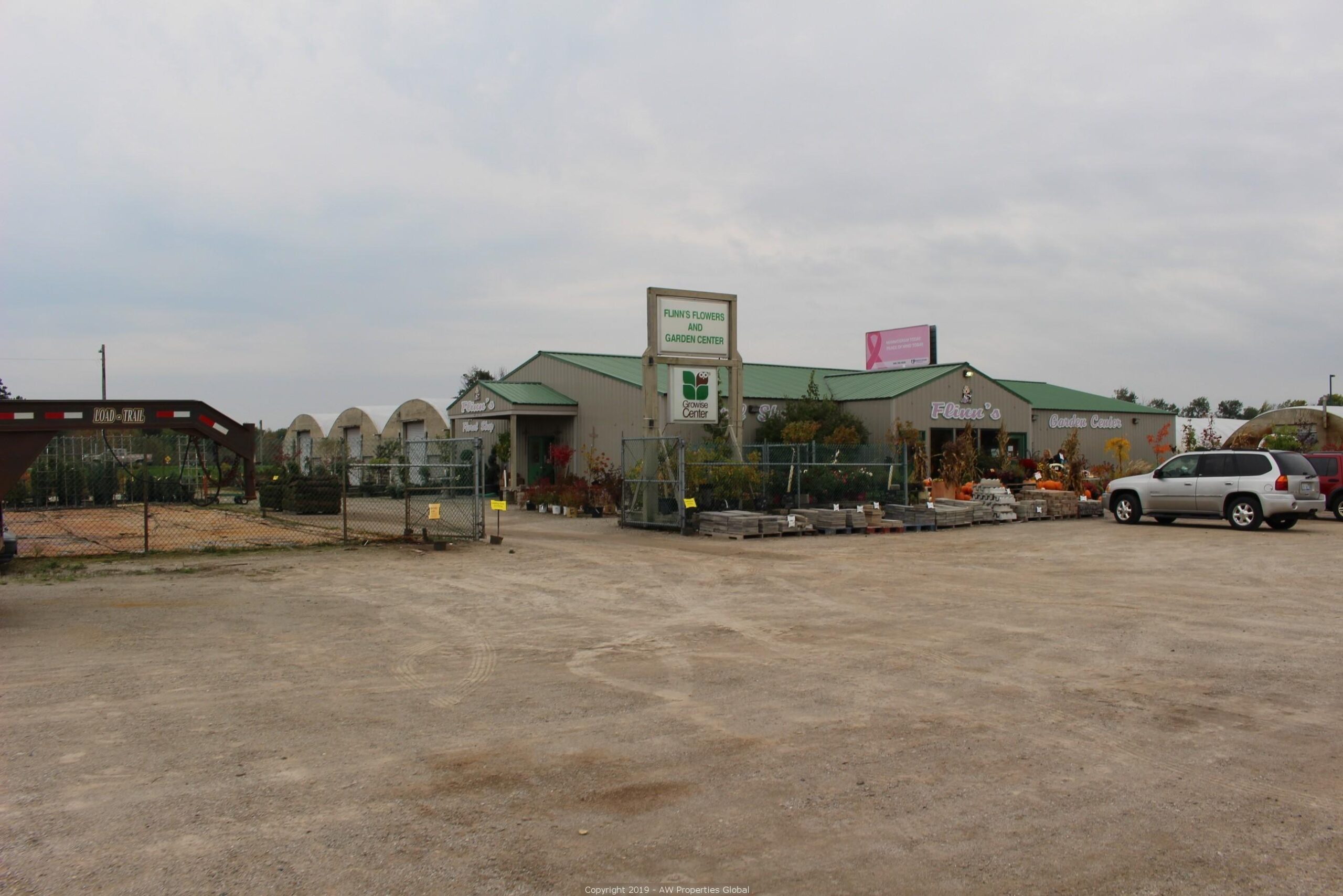 Approx. 3 Acres Commercial Zoned Land with 1 Building & 5 Greenhouses